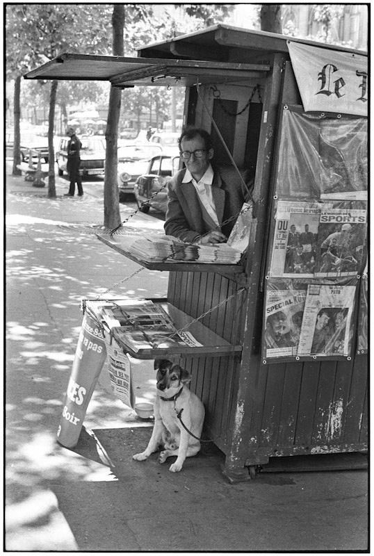 Paris, newspaper stand by Elliott Erwitt